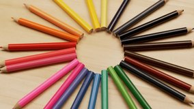 Circle of Colorful Rainbow Pencils, Rotation, Close-up, Top View. A Circle of Pencils in the Shape of the Sun. School Supplies for Education. Pencils for Drawing. - Powered by Shutterstock - Get 15% off with code: PIKWIZARD15