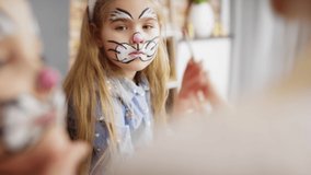 Close up video of face painting for Easter bunny. Shot with RED helium camera in 8K