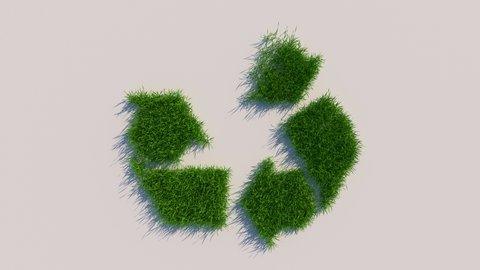 Recycle sign shown with growing grass. Ecological concept of waste processing. Includes an alpha channel.