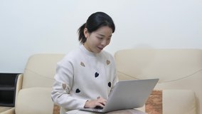 Asian women work from home, play on their phones.Asian women.