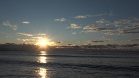 Beautiful Sunset is a stock video that exhibits stunning footage of a sunset over the sea.This video will look awesome in any video project that has to do with sunset, sea, romance, water, waves