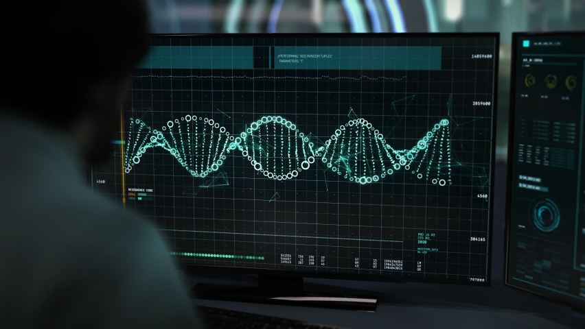 Dark computer monitor. Scientist is studying a DNA sequence. Advanced biomedical software. Computer coding and DNA digital analysis on screen. Modern medicine concepts and technologies. UI Royalty-Free Stock Footage #1066634497