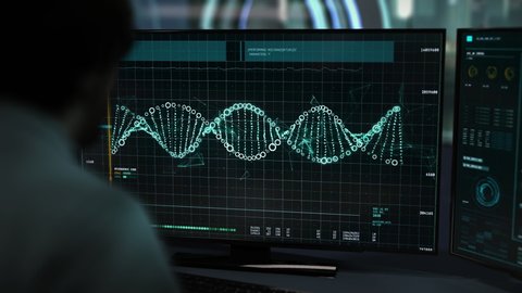 Dark computer monitor. Scientist is studying a DNA sequence. Advanced biomedical software. Computer coding and DNA digital analysis on screen. Modern medicine concepts and technologies. UI