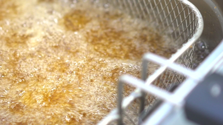Oil is frying for delicious food. | Shutterstock HD Video #1066635715