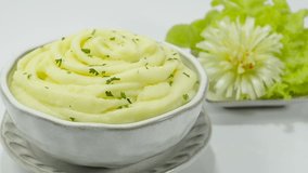 Mashed Potatoes Creamy Delicious Side dish decoration carved vegetables sideview - Powered by Shutterstock - Get 15% off with code: PIKWIZARD15