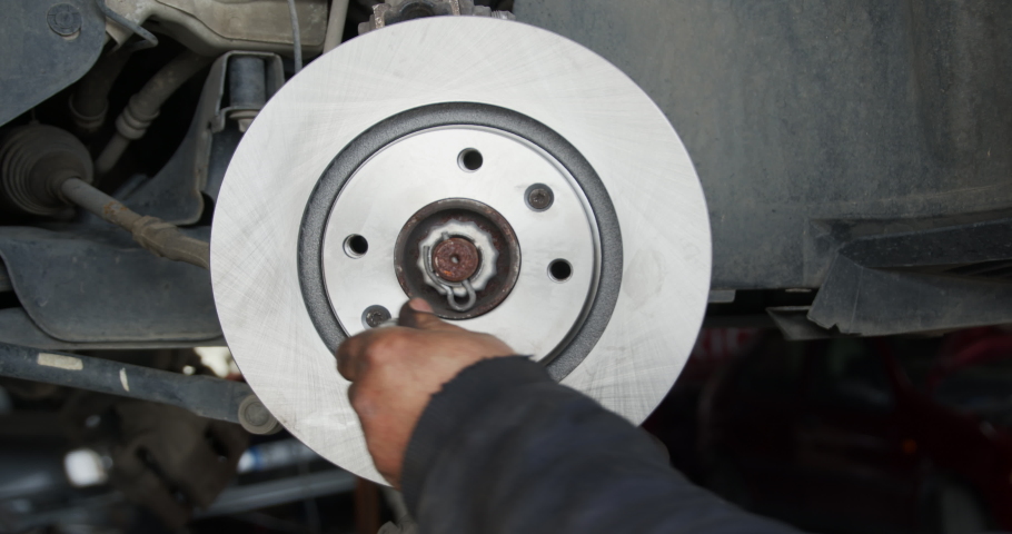 Car Brake Pads and Brake Disc Replacement In Car Repair Service. | Shutterstock HD Video #1066664362
