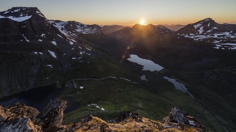 Colorful sunset over the Innerdalen valley with lakes