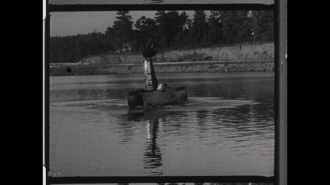 1940s Oshkosh, WI. Stunt Man Crashes Biplane into Lake. The Daredevil Survives the Crash Landing. 4K Overscan of 16mm Film Vintage Archival Print 