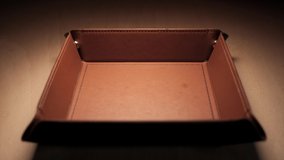 Many dice of different colours falling into a dice tray in slow motion. - Powered by Shutterstock - Get 15% off with code: PIKWIZARD15