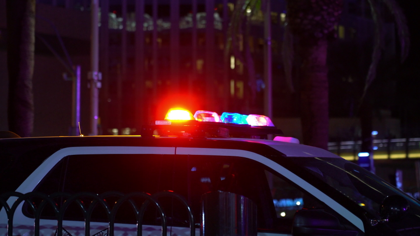Police Car Emergency Lights Flashing at Night for Crime Scene Royalty-Free Stock Footage #1066687984