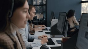 Call center and helpful customer service. Use pc computer and answer questions on phone line at modern co-working. Diverse group of people talks on sale hotline. Busy seller at agency office indoors - Powered by Shutterstock - Get 15% off with code: PIKWIZARD15