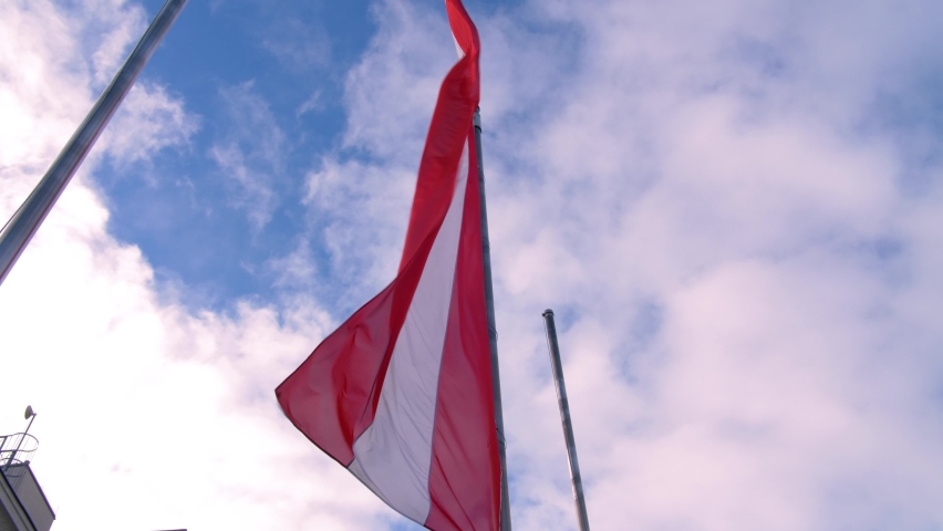 
Austrian flag waving in strong wind