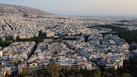 ATHENS, GREECE - September 4, 2019 : View of Athens buildings from a high point. The Acropolis and the Parthenon can be seen in the distance. 