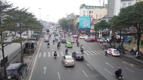Hanoi, Vietnam, 03.04.2020: busy main street on a cloudy day