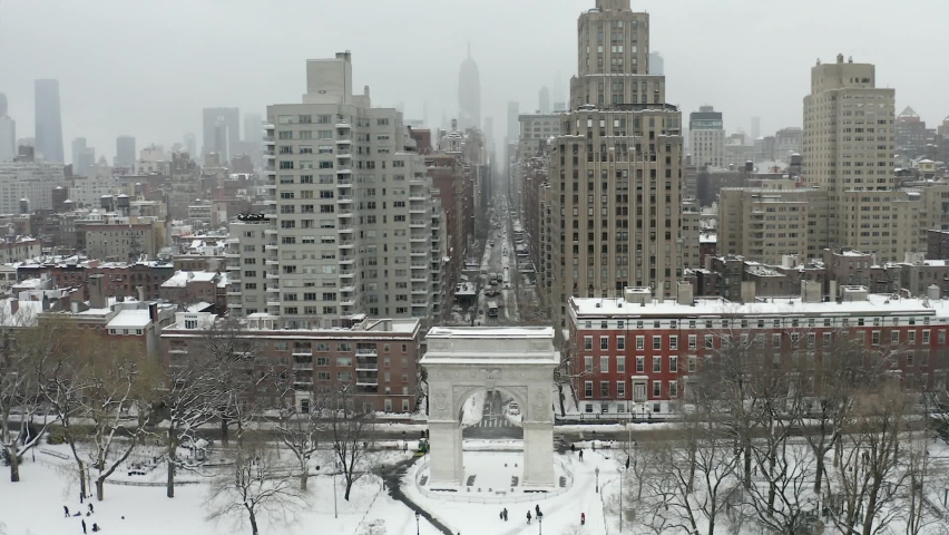 Aerial drone flying over arch of Washington Square Park in New York City NYC