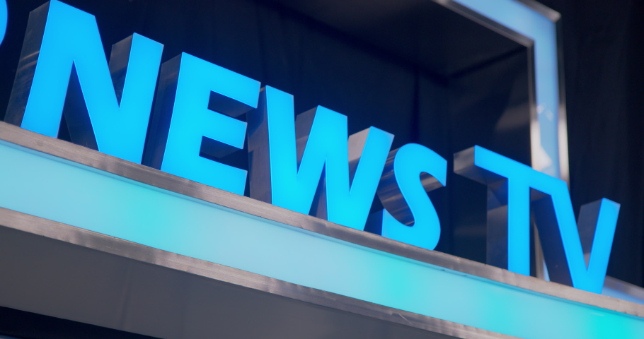Live TV news broadcast billboard