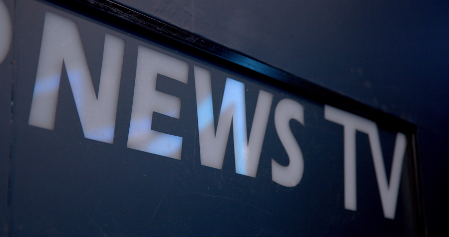 Live TV news broadcast billboard