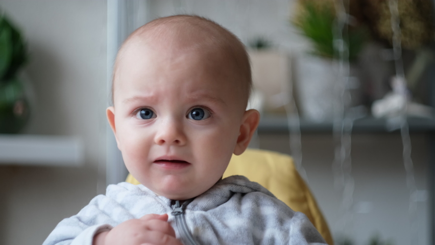 Tired kid weeping and crying. Upset little baby crying indoors. Infant baby boy closeup. | Shutterstock HD Video #1066713253