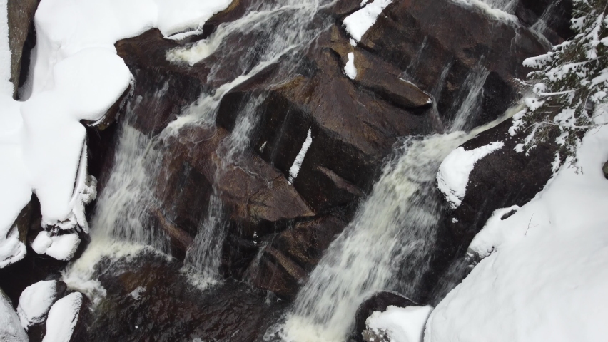 Waterfall in winter.  Forest environment in winter