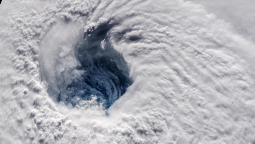 Satellite imagery of a hurricane view from above. Contains public domain image by NASA.