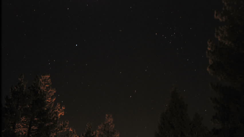 time lapse shot in Big Bear, CA.  stars move across the night sky.  