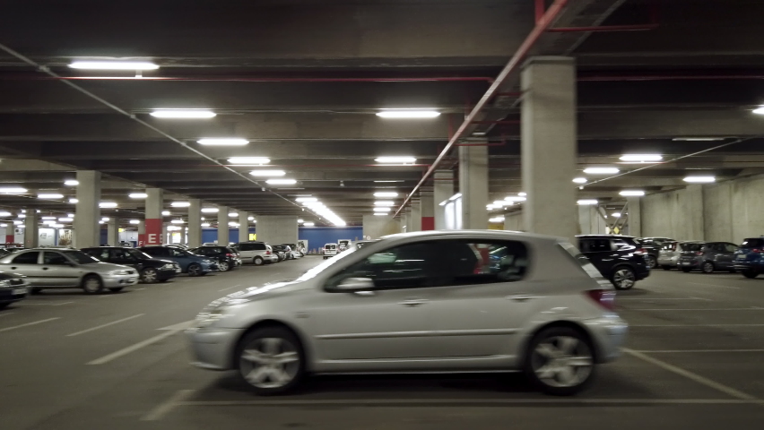 Drive on shopping mall underground parking lot or garage | Shutterstock HD Video #1066741627
