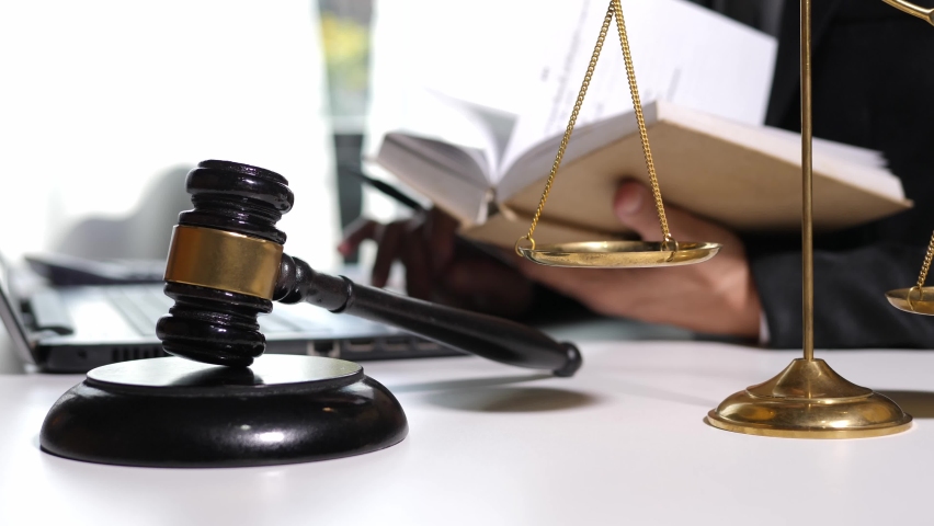 Judge gavel with Justice lawyers having team Concepts of Law and Legal services Royalty-Free Stock Footage #1066742743