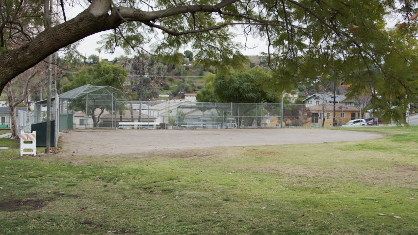 Empty Baseball Field in Los Angeles Park, sad cloudy closed Pandemic Covid