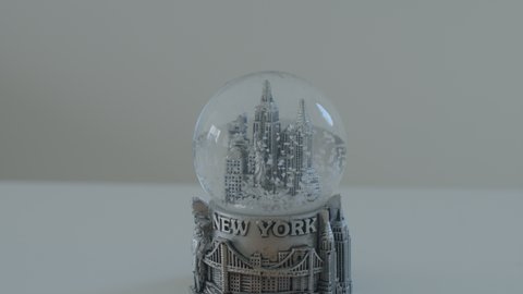Footage of a tourist snow globe souvenir from a visit to New York City in the United States.
