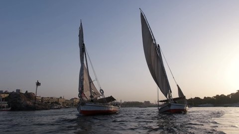 Felucca Sailing in the Afternoon Sunset on Nile River, Aswan, Egypt