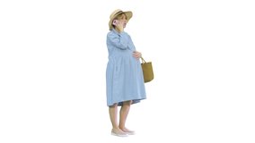 Worried Pregnant Woman Talking on the Phone having contractions on white background. - Powered by Shutterstock - Get 15% off with code: PIKWIZARD15