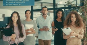 Successful people. Group of young business woman and man mixed race in modern work space. Creative team meeting. We are stronger together. 4k video Slow motion