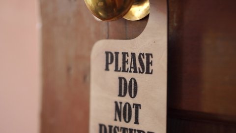 'Do Not Disturb' Sign Hanging From Outside Room, 4K