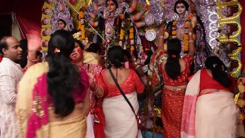 Delhi- India 
10th Oct 2019 
Indian Bengali women performing traditional as Devi Boron during  Durga Puja Festival also known as Sindoor Khela or Sindur Khela
