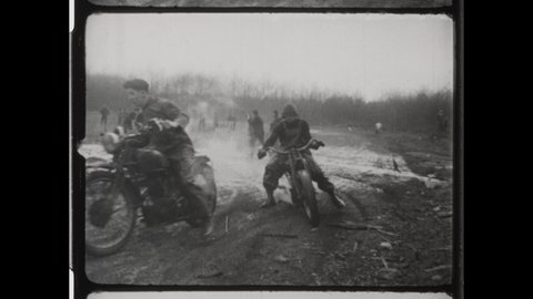 1940s Lansing, MI. Harley-Davidson Motorbikes Race Off Road on Mud Track at Jack Pine Endurance Run. Popular Event among WWII Veterans. 4K Overscan of Vintage Archival 16mm Film Print