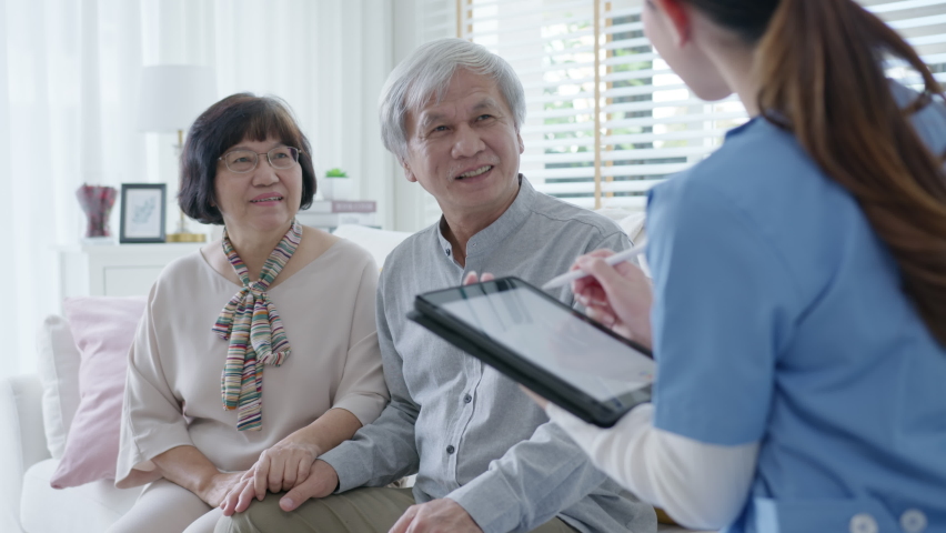 Young asian woman or nurse home smile looking at camera with senior grandmother give support empathy to elderly lady or older people in assisted living homecare mental health sick relief concept. | Shutterstock HD Video #1066809682