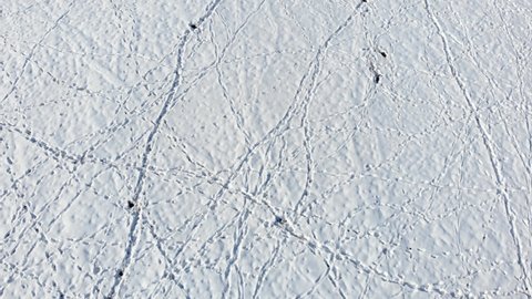 Cattle Tracks in Snow Reveal Old Worn Out Barn - Aerial Drone