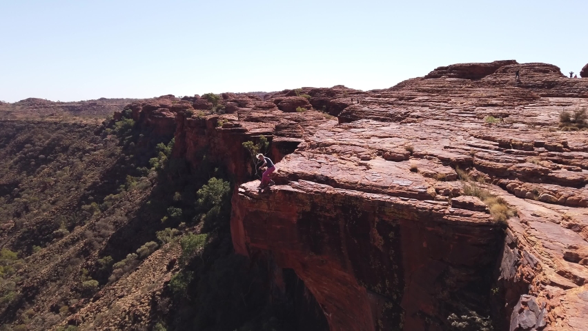 red sandstone with spectacular desert landscape of Kings Canyon cliffs in Australia Outback Red Center, Northern Territory. Aerial view of Watarrka National Park.