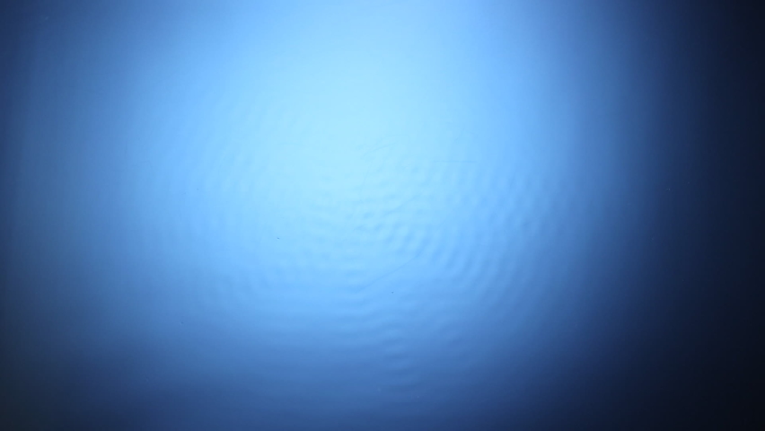 sound waves vibration on water surface closeup. water background Royalty-Free Stock Footage #1066833127