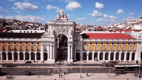 Flying over The Triumphal Arch on Praca do Comercio. Drone 4k video. Rua Augusta, Lisbon, Portugal.