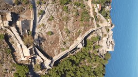 Vertical video Alanya Castle - Alanya Kalesi aerial view. Turkey