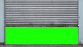 Grungy Urban Metal Store Shutters Opening And Then Closing, With Green Screen Behind - Powered by Shutterstock - Get 15% off with code: PIKWIZARD15