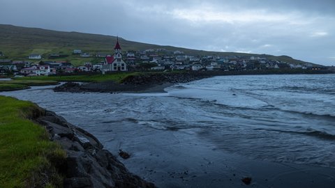 Timelapse of a sunset at the small village Sandavagur on the Island Vagar on the Faroe Islands