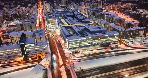 Espoo, Finland - January 11, 2021: Aerial hyper-lapse of Iso Omena shopping center and Matinkyla neighborhood.