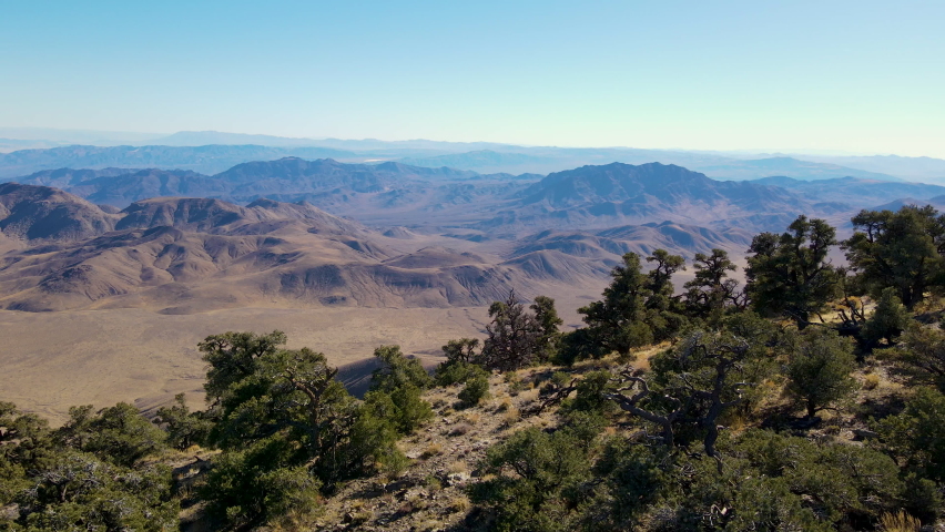 Cinematic aerial shot of arid landscape in Death Valley in California