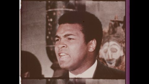 1960s Louisville, KY. The Champ  Muhammad Ali reflects back about his First Amateur Fight. Young 16 year-old Ali boxing in Ring at Freedom Hall. 4K Overscan of Archival 16mm Film Print