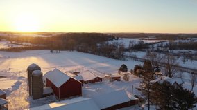 Aerial view of American countryside landscape in winter. Farm from above. Sunny, sunset (sunrise), sunshine freezing cold weather. Wisconsin, United States - Powered by Shutterstock - Get 15% off with code: PIKWIZARD15
