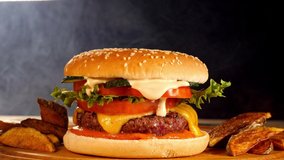 Smoke clouds envelop a tasty burger with crispy countrylike potato  - Powered by Shutterstock - Get 15% off with code: PIKWIZARD15
