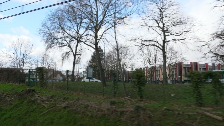 Suburban Neighborhood Town Row Houses. POV View out  of RER Train Window. Paris Suburbs near Railway. Ile-de-France Europe. 2020. 2x Slow motion 60 fps 4K