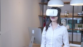 Asian female in virtual reality headset instruction at home
